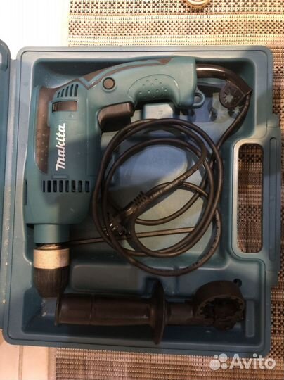 Ударная дрель Makita HP1640k