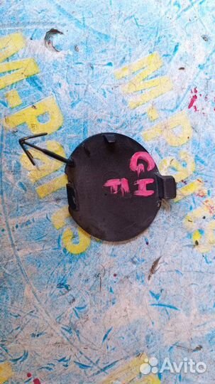 Заглушка буксировочного крюка передняя Mazda