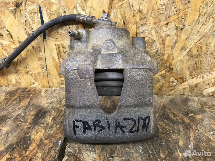 Суппорт тормозной передний правый Skoda Fabia 2