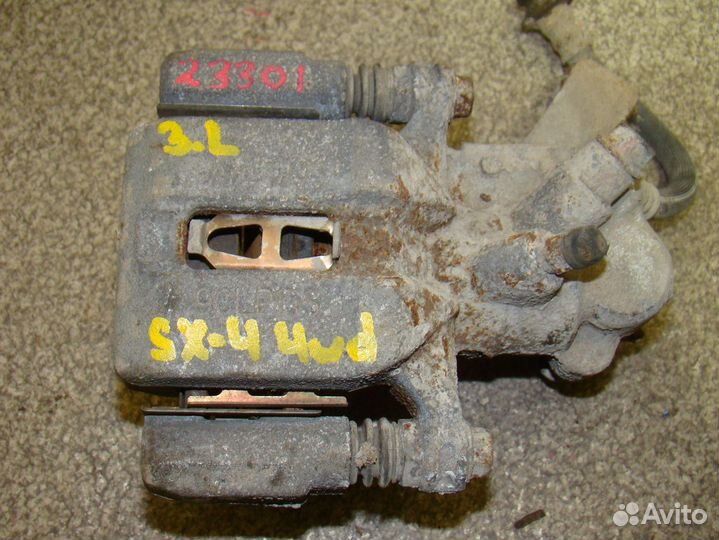 Суппорт задний левый Suzuki SX4