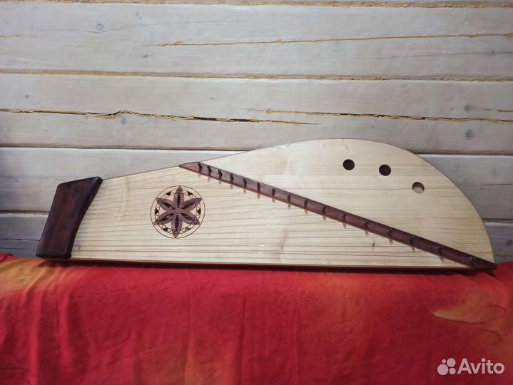 Гусли крыловидные