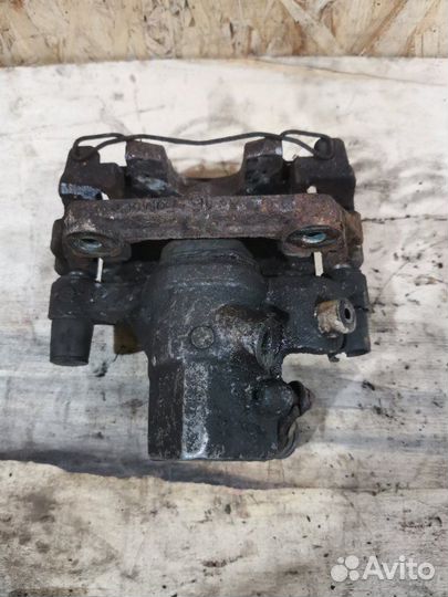 Суппорт тормозной задний правый Ford Focus 2 купе