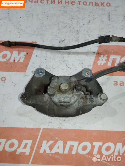 Суппорт тормозной передний левый Mitsubishi