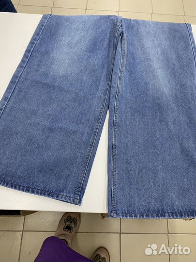 Джинсы широкие