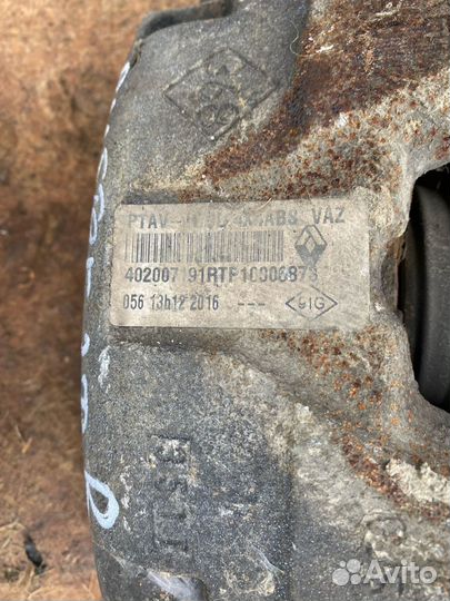 Суппорт тормозной передний Renault Duster 4WD