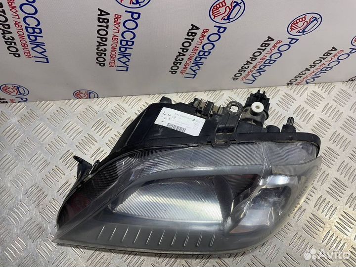 Фара левая Renault Logan