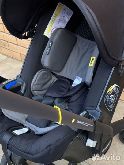 Doona Plus, nitro black с базой isofix