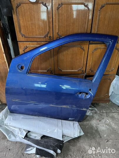 Дверь водительская renault logan