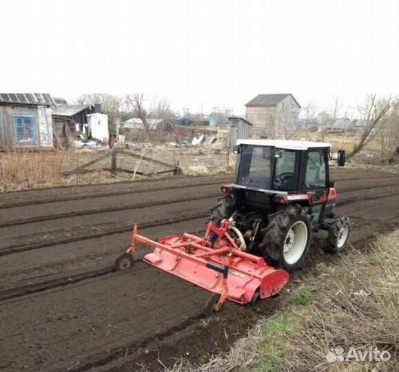 Вспашка земли минитрактором