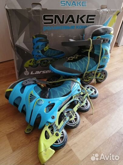 Роликовые коньки