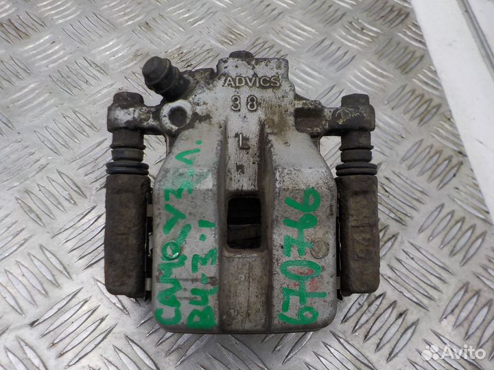 Суппорт тормозной задний левый Toyota Camry 2006-2