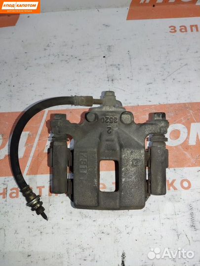 Суппорт тормозной задний левый Nissan X-Trail T31