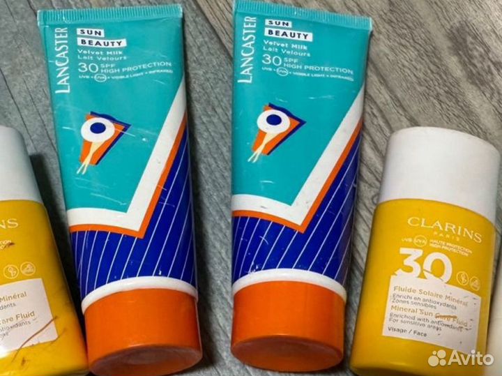 Средства от загара Lancaster и Clarins