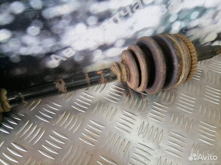 Полуось левый Kia Carens 2.0 2002-2006