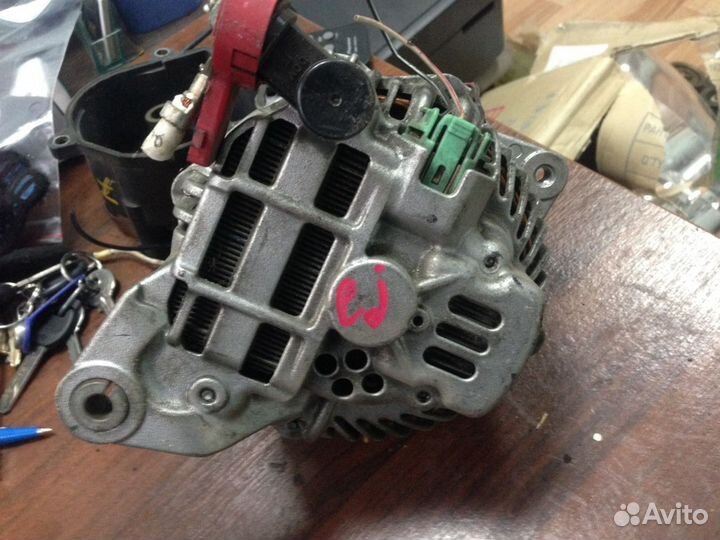 Генератор Subaru 23700AA521