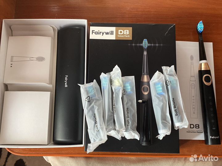 Электрическая зубная щетка