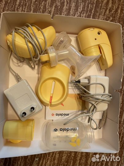 Молокоотсос medela mini electric