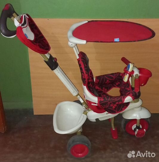 Трехколесный велосипед с ручкой