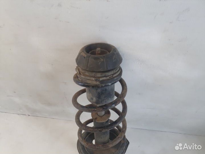 Амортизатор передний левый Chevrolet Lacetti J200