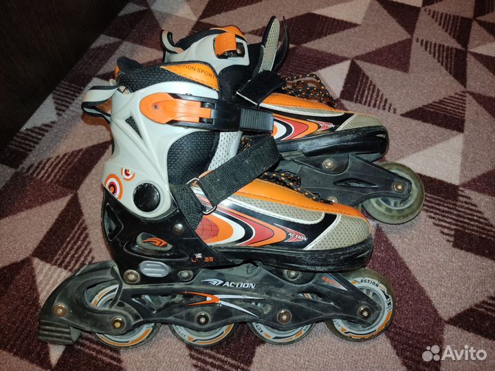 Роликовые коньки