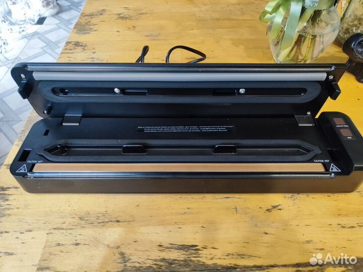 Вакуумный упаковщик