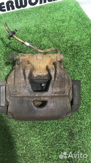 Суппорт тормозной передний левый Jaguar XF