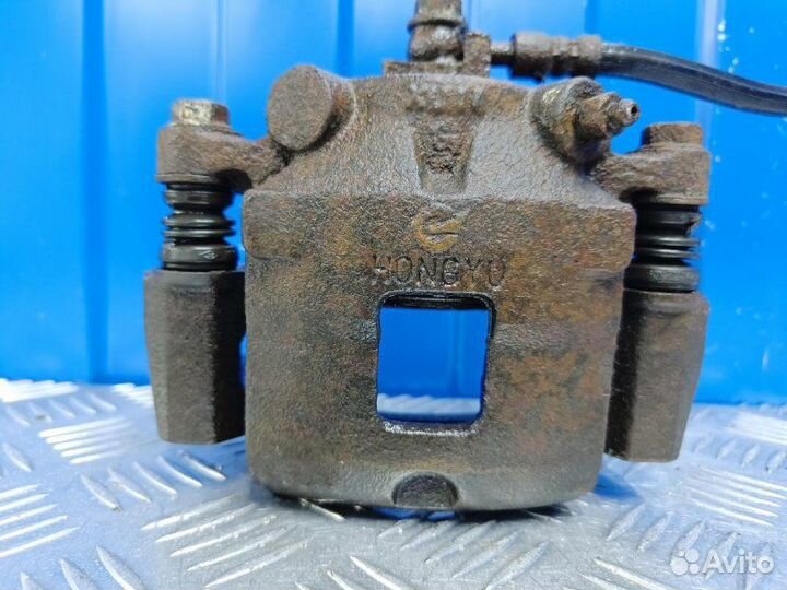 Суппорт передний левый Chery Kimo A1 S12 1.3