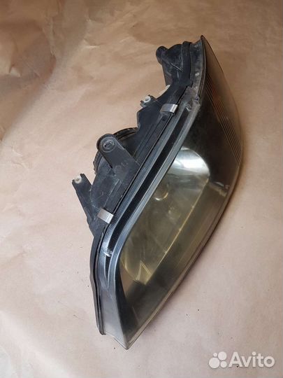 Фара левая Митсубиси Спейс стар