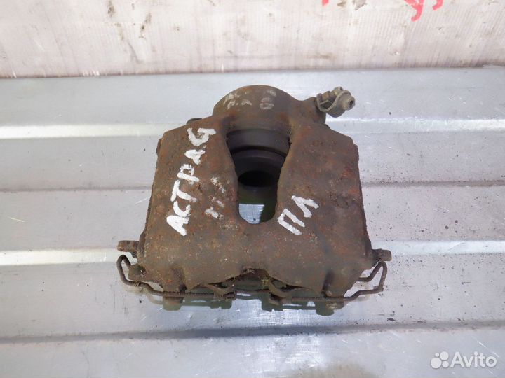Суппорт передний левый Опель Астра Г