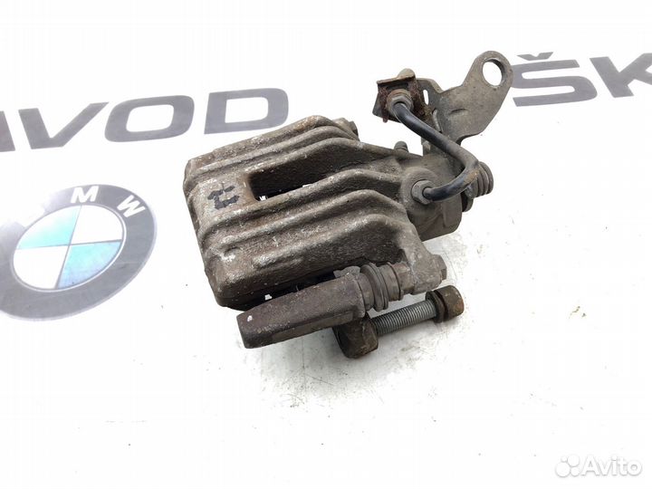 Суппорт тормозной задний правый Skoda Octavia A5