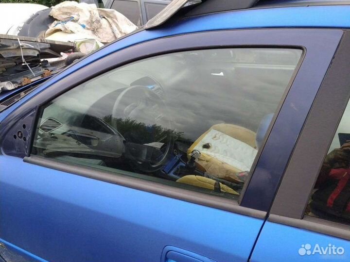 Стекло переднее левое Opel Astra G универсал 1.6I