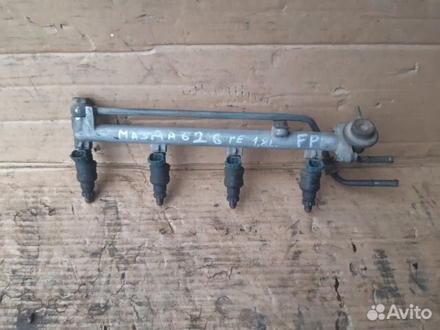 Форсунка топливная Мазда 626 ге