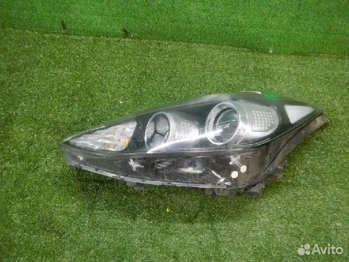 Фара левая Kia Sportage