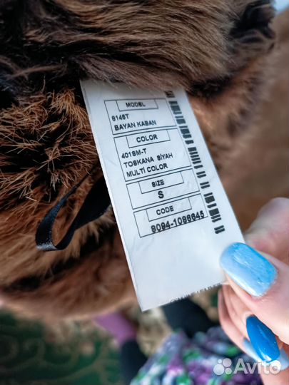 Женская дубленка таскана