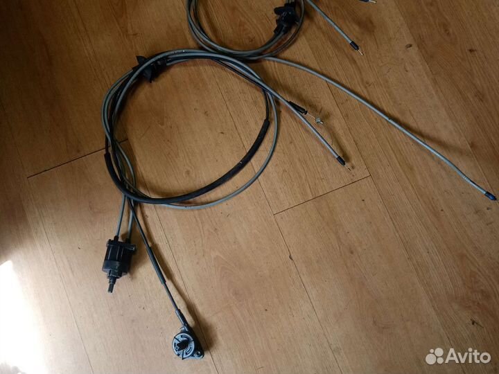 Трос капота и корректора фар Рено Логан1
