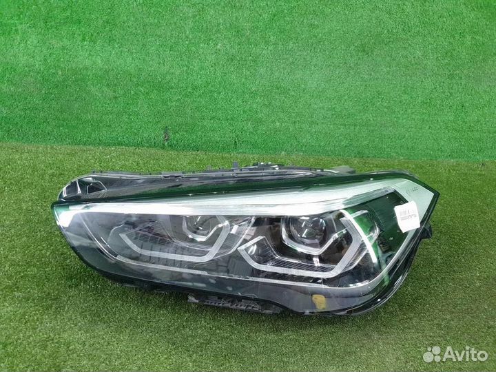 Фара левая BMW X1