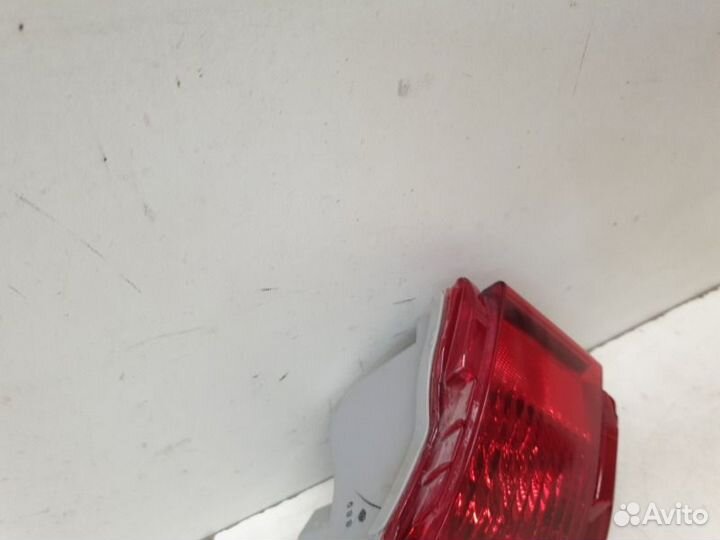 Фонарь противотуманный задний левый Toyota Land