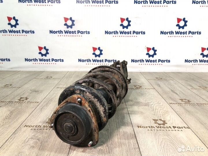 Стойка амортизатора передняя правая Subaru Outback