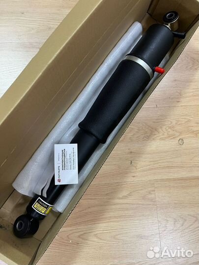 Амортизатор задний новый на Cadillac Escalade