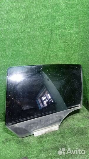 Стекло двери задней левой Opel Astra