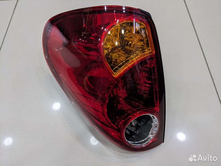 Фонарь задний левый mitsubishi L200 2006-2014