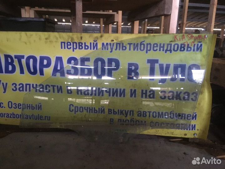 Стекло двери переднее левое Kia Shuma