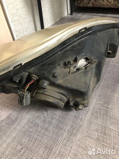 Фара mazda demio