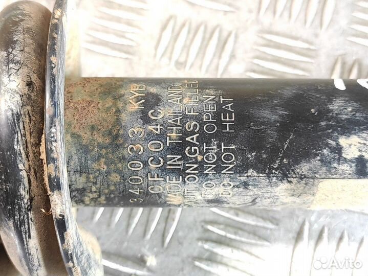 Амортизатор передний левый Mitsubishi L200 2006-20