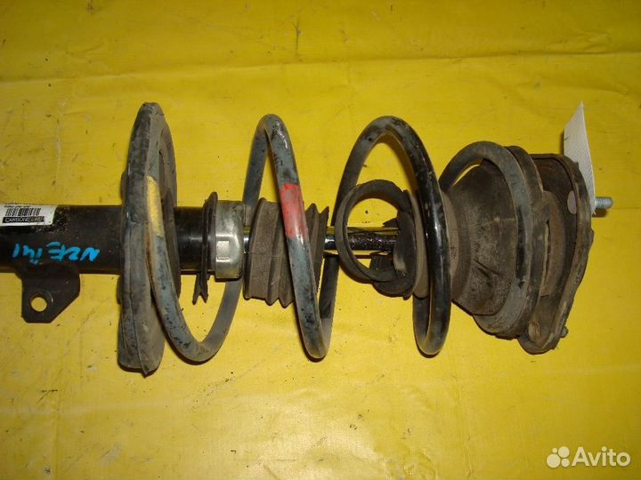 Стойка Toyota Corolla fielder NZE141G (Переднее Левое)