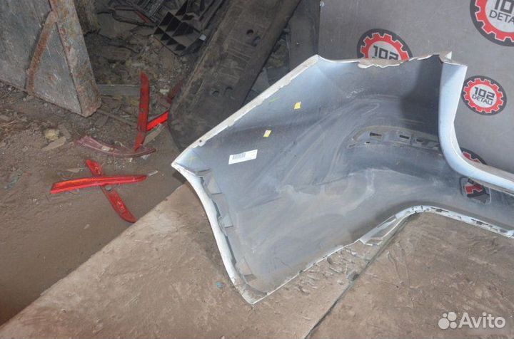 Бампер задний Opel Astra J