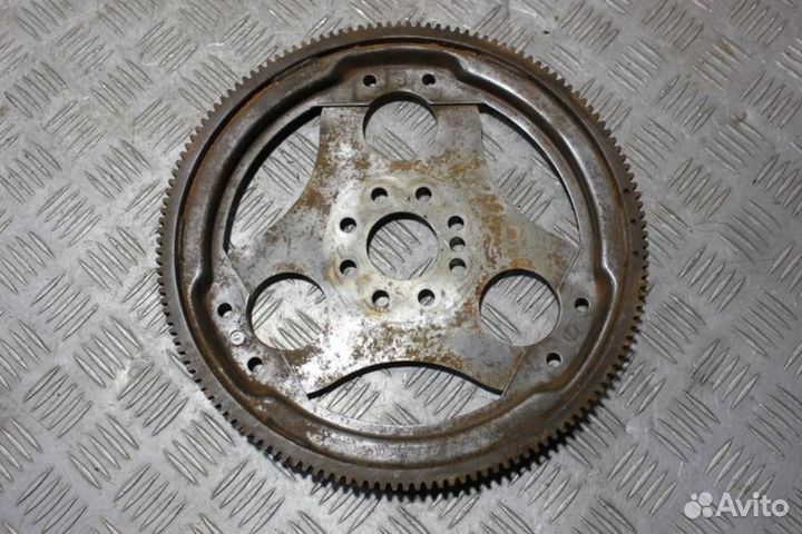 Маховик E 210