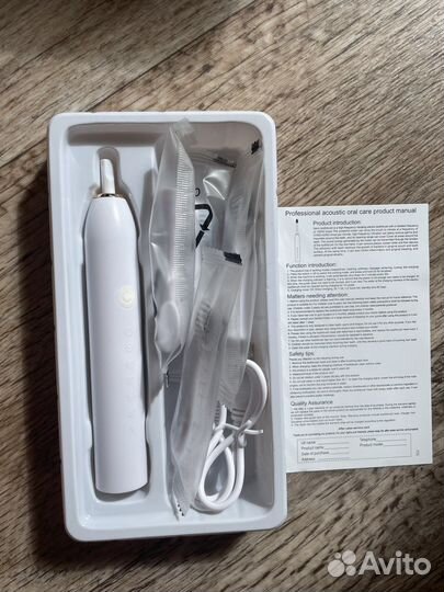 Электронная зубная щетка