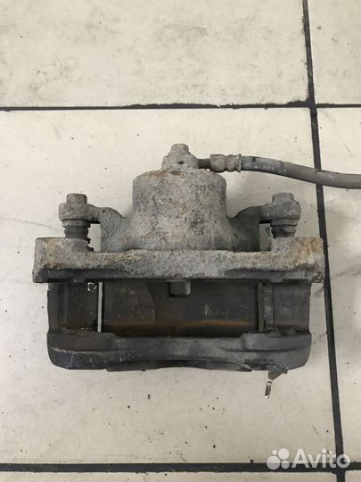 Суппорт тормозной Nissan Teana J32