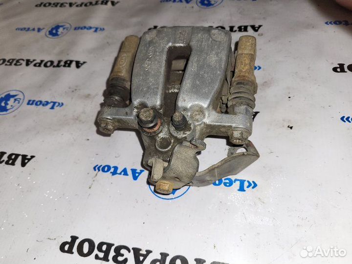 Суппорт тормозной задний левый Kia Ceed JD G4FG